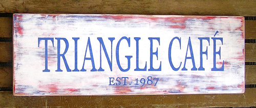 Hand painted distressed wood sign