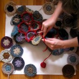 Hexagon wool crochet rug in progress by anneemcgraw